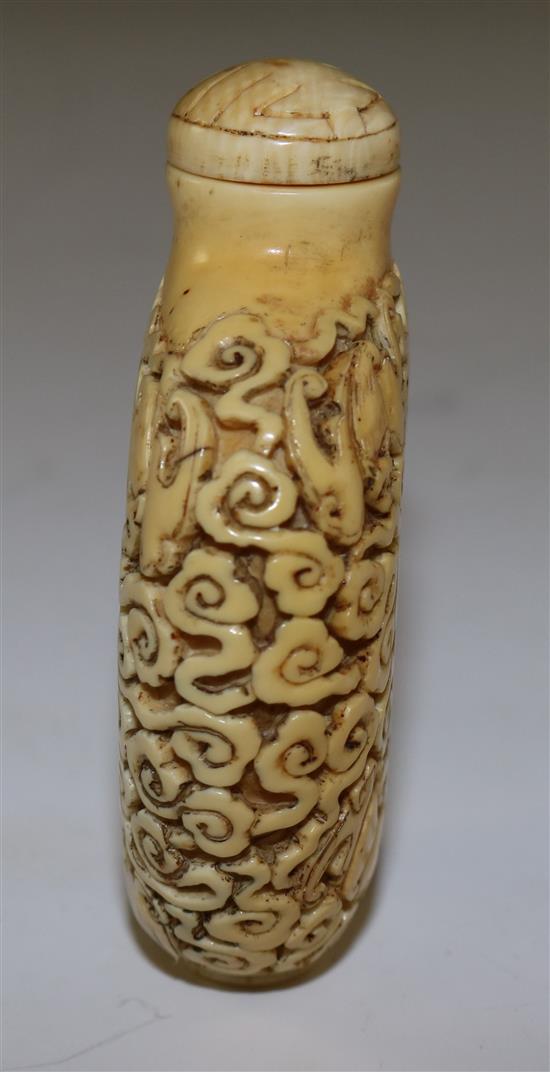 A rare Chinese ivory five bats snuff bottle, 1800-1900, Richards no. 421, matched stopper